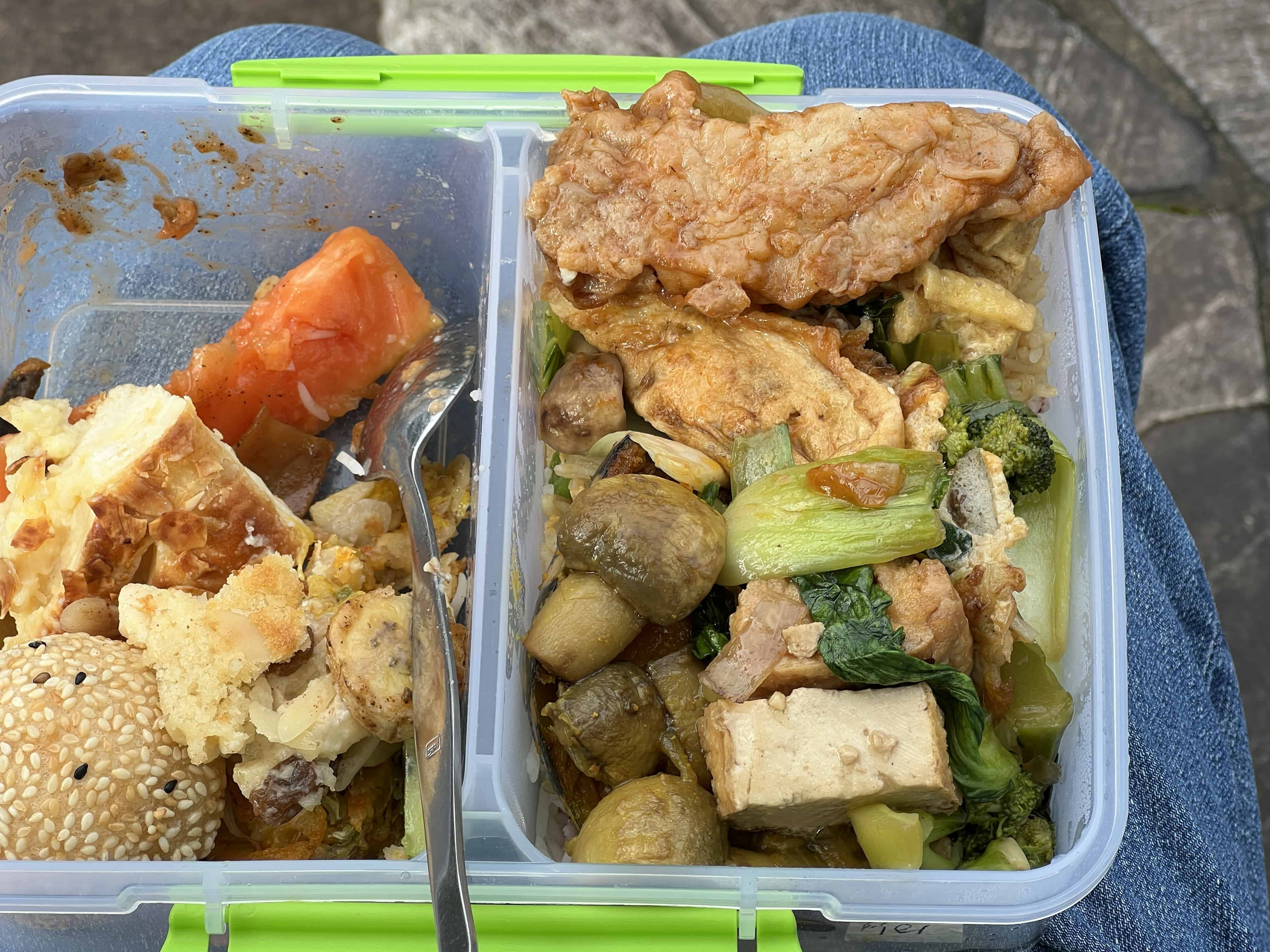 A tupperware container filled with alms food