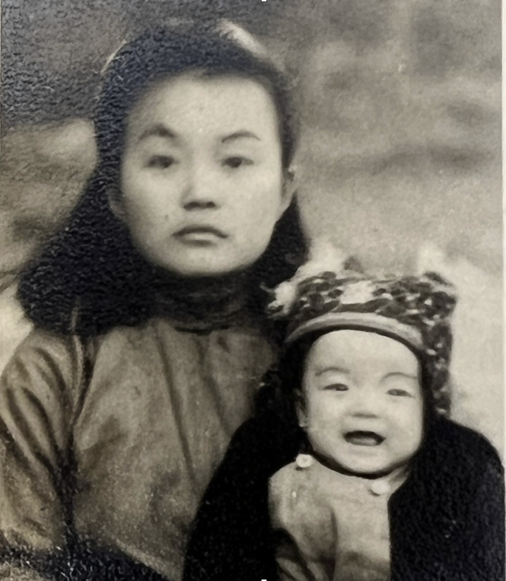 My father as a baby with his mum, just before they left for Singapore